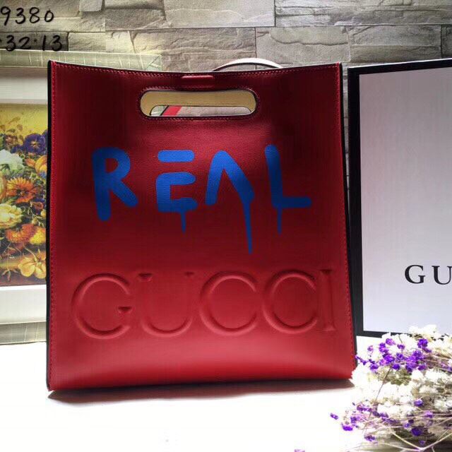 G*u*i top handle bags